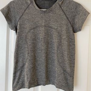 Grey short sleeve swiftly tech race length size 6